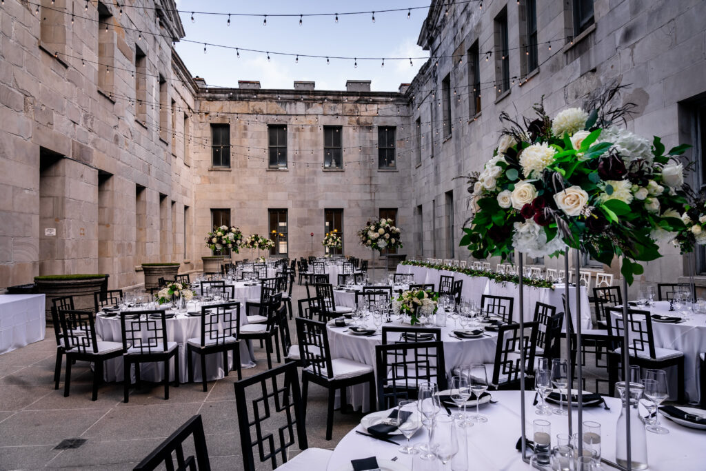 A large room with tables and chairs in it