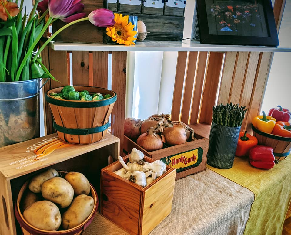 A table with many different fruits and vegetables.