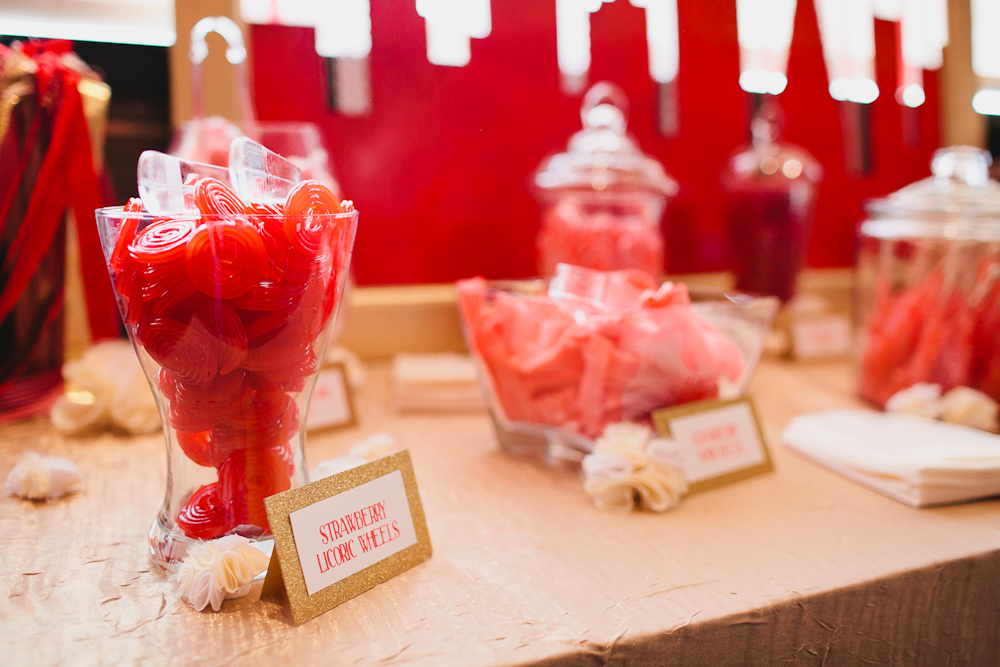 A table with several different types of candy.