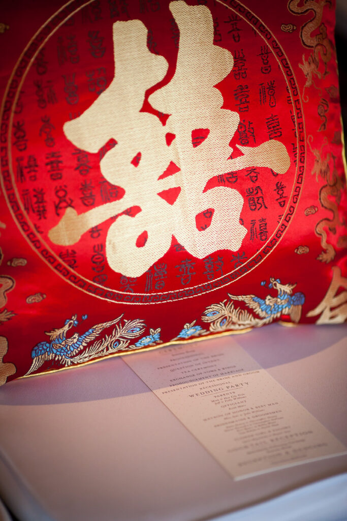 A red bag with chinese writing on it.