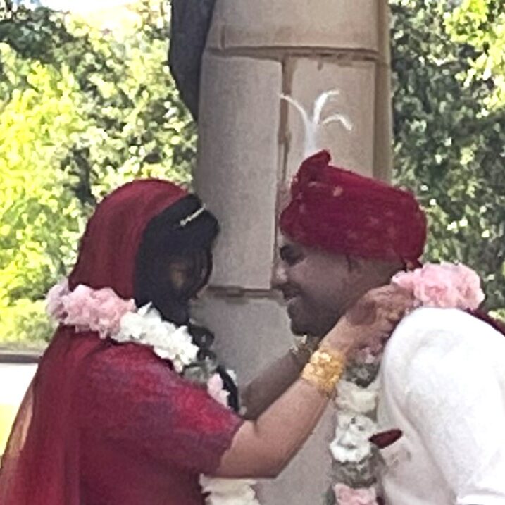 A man and woman in traditional indian garb.