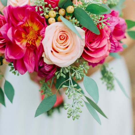 8 A bouquet of flowers is held by the bride.