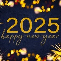 NY3b A blue background with gold lettering and fireworks.